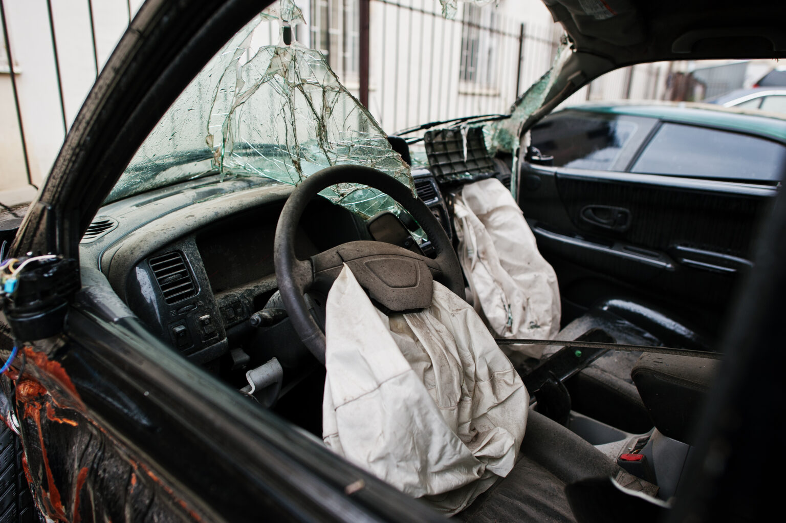 car-after-accident-car-interior-with-airbag-after-crash-scaled